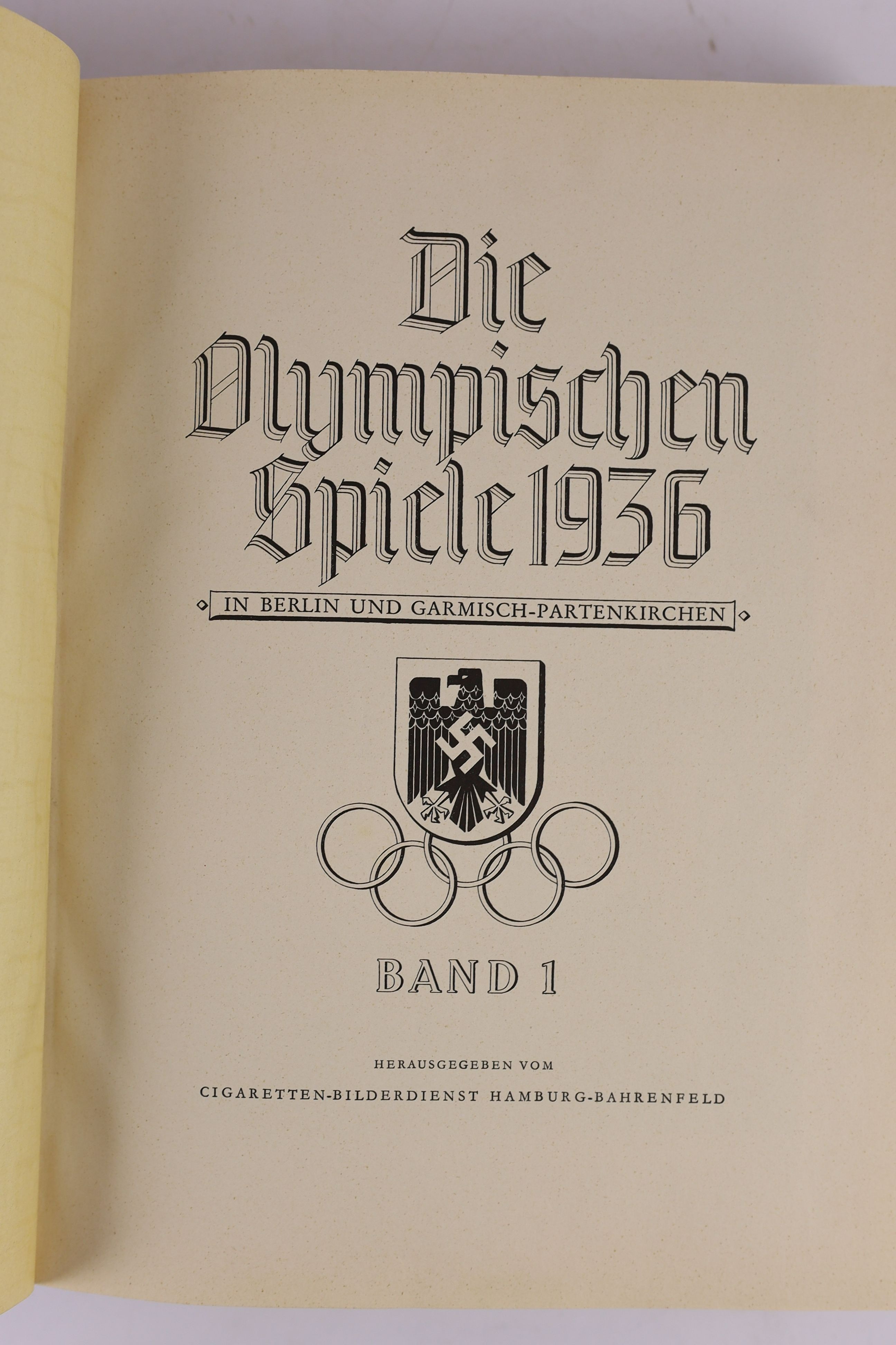 Anon - Die Olympischen Spiele 1936. 1st ed. 2. Vol. Complete with numerous illustrated plates and text illus. Original cloth with unclipped pictorial d/j. Folio. Cigaretten-Bilderdienst, Germany, 1936.